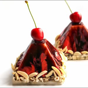Cherry Crémeux with Spiced Chocolate and Salted Caramel on Popcorn Base ~ Éclectique Desserts